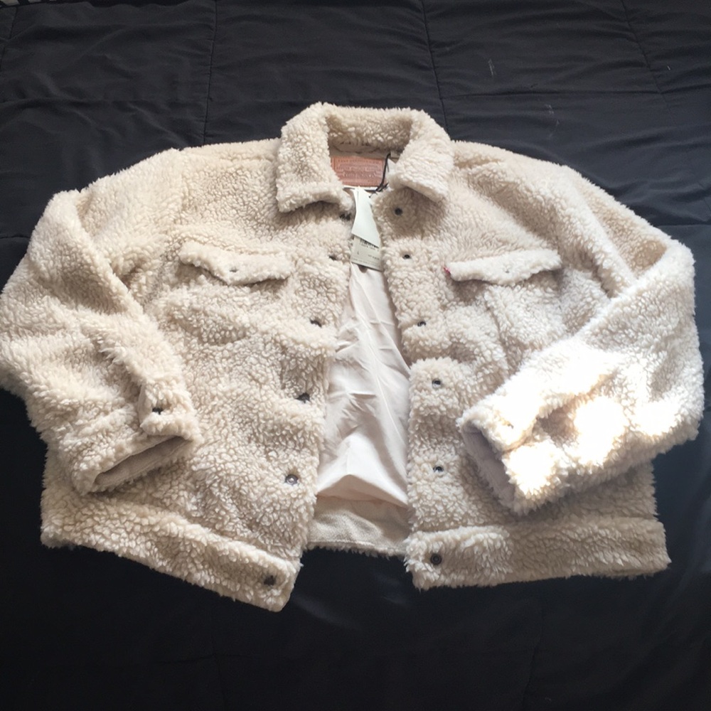 Levi’s cloud cream all over Sherpa trucker jacket